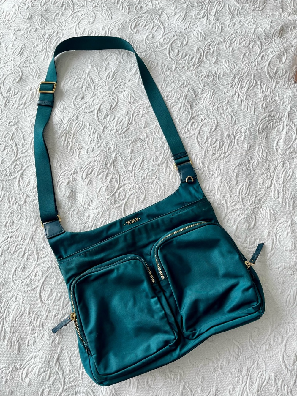 Tumi Teal Green Crossbody Bag with Dual Zippered Front Pockets